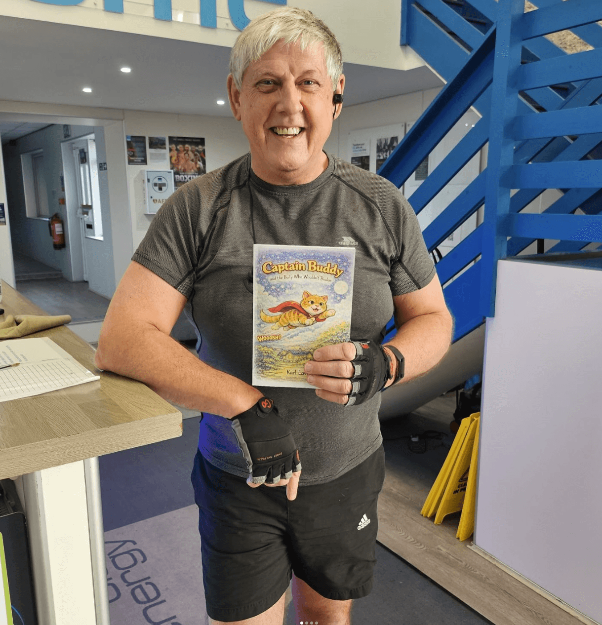 Member with a book at a Club Energy event